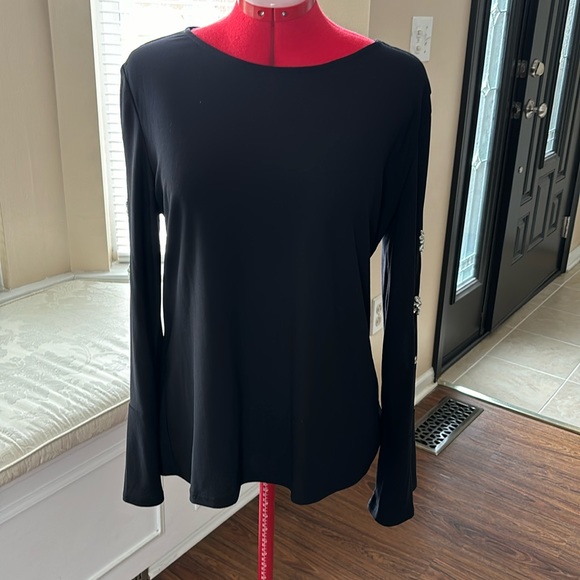 Black polyester/spandex blend, with embellished sleeves. - Picture 2 of 9